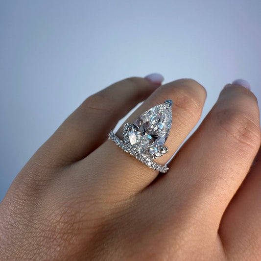 14k White Gold Pear Diamond Ring with Accented Band