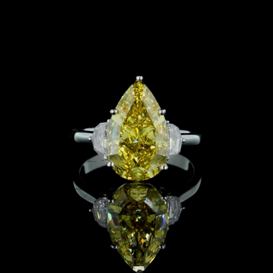 6.02 ct. Yellow Diamond Side Stone Ring