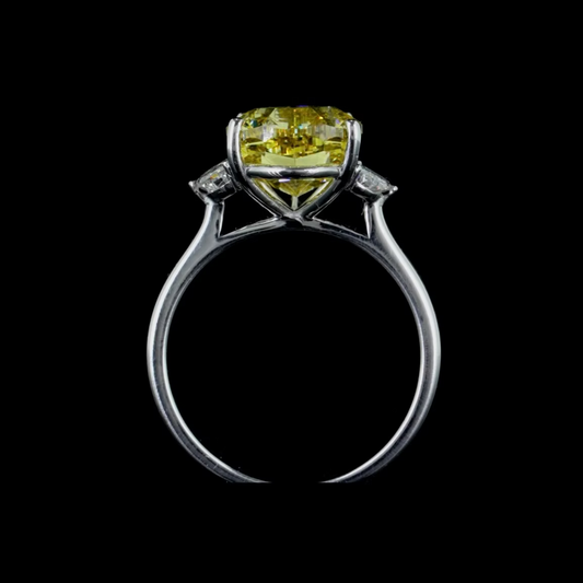 6.02 ct. Yellow Diamond Side Stone Ring