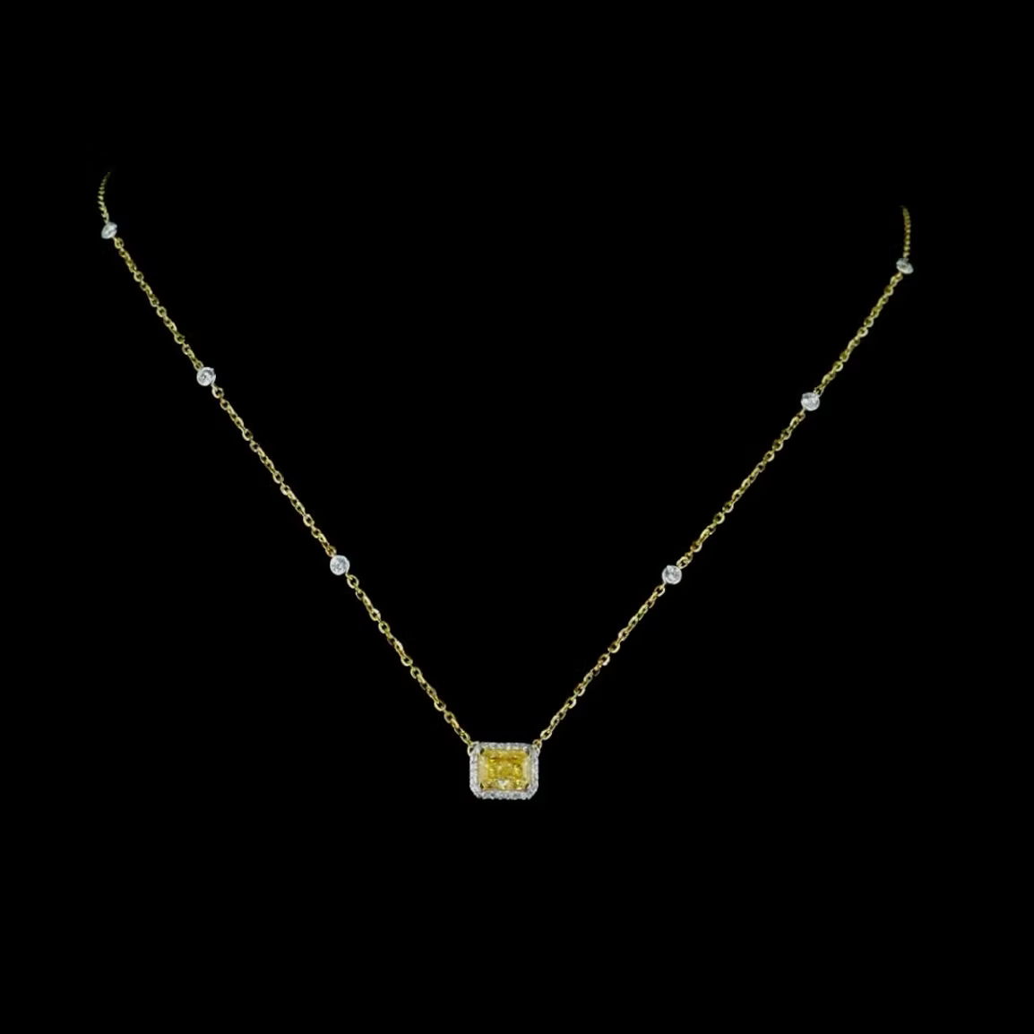 1.29 ct. Yellow Diamond Halo Pendant