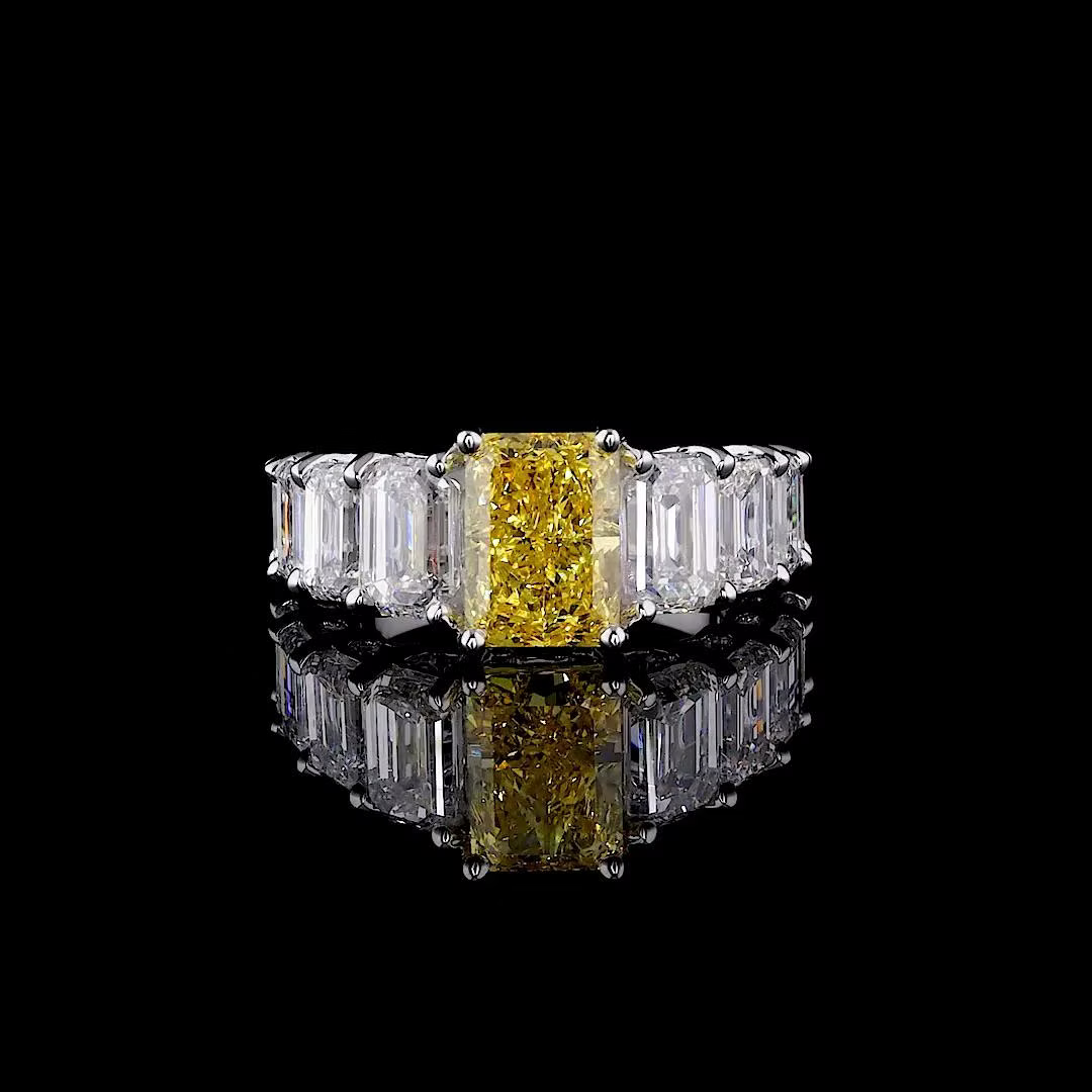 2.72 ct. Yellow Diamond Side Stone Ring