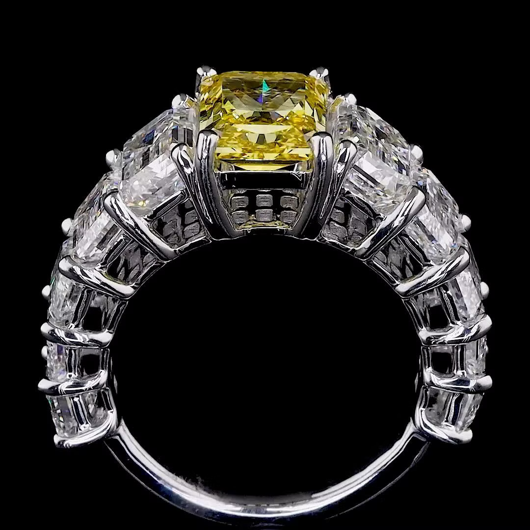 2.72 ct. Yellow Diamond Side Stone Ring
