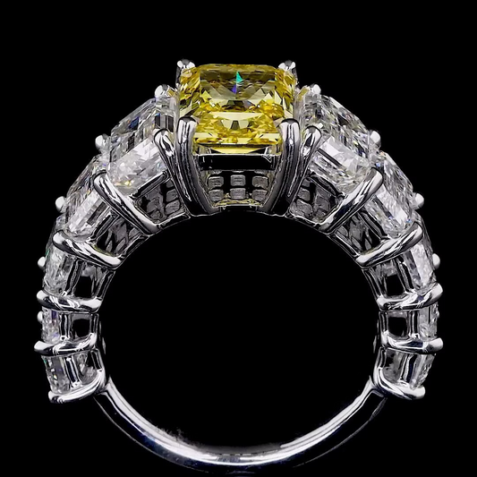 2.72 ct. Yellow Diamond Side Stone Ring