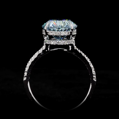 8.18 Ct. Fancy Vivid Blue Oval Diamond Pavé Ring