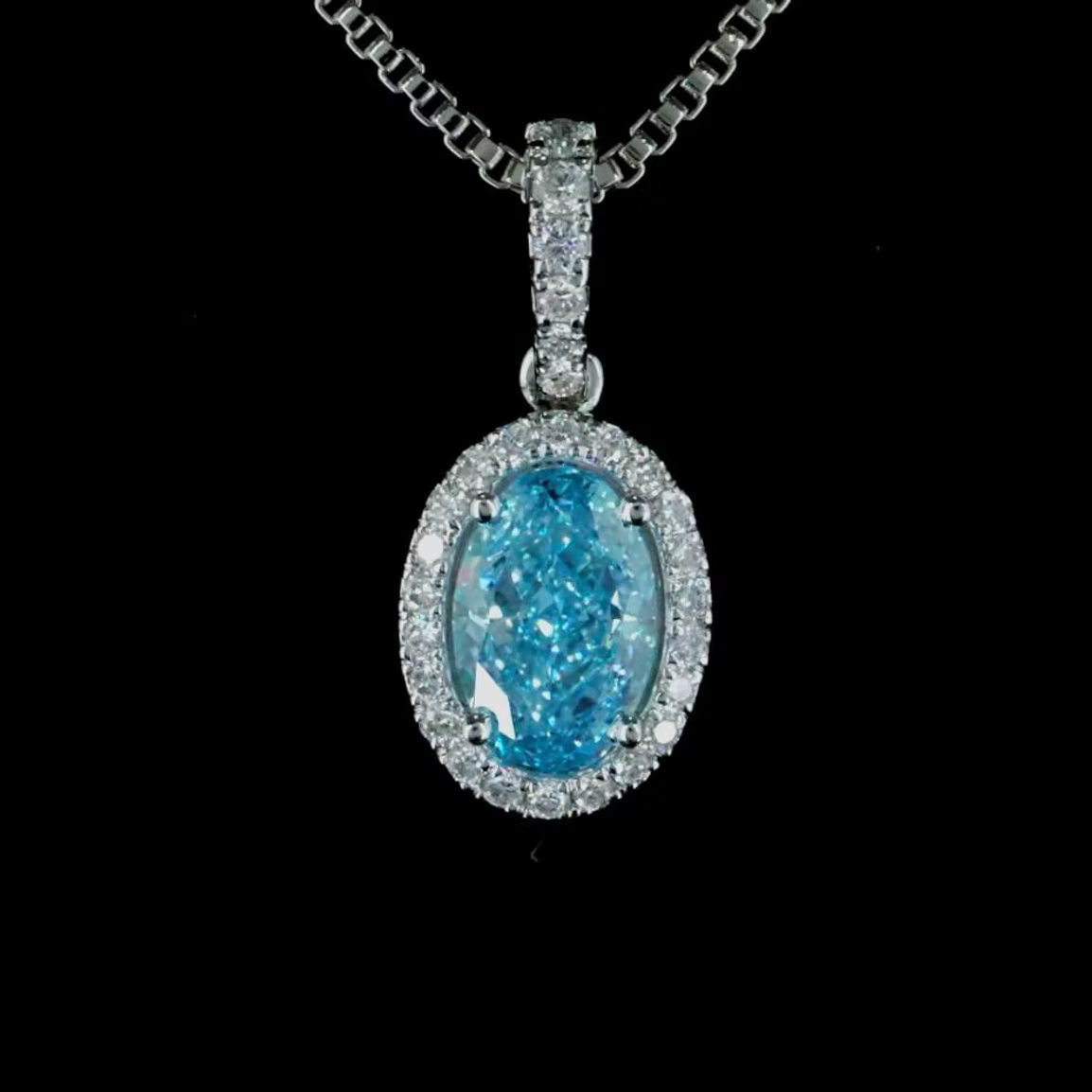 0.91 ct. Blue Diamond Halo Pendant