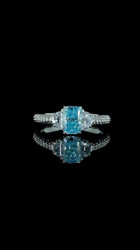 1.08 ct. Blue Diamond Side Stone Ring