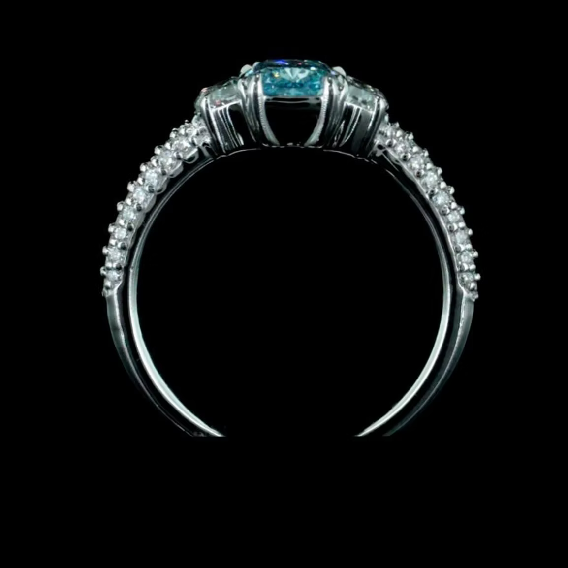 1.08 ct. Blue Diamond Side Stone Ring
