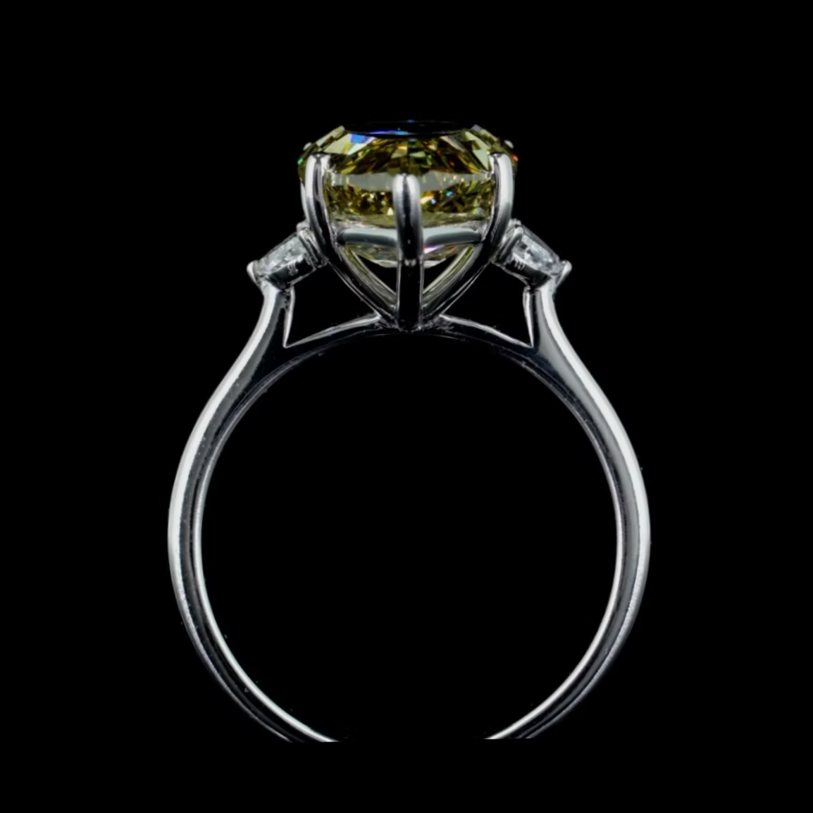 6.32 ct. Yellow Diamond Side Stone Ring