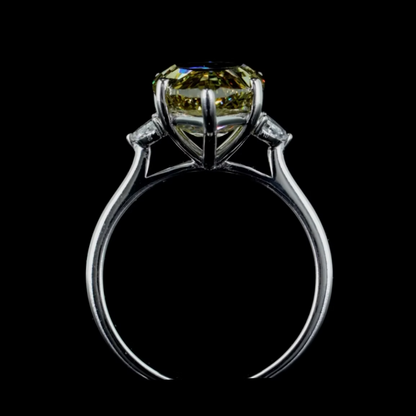 6.32 ct. Yellow Diamond Side Stone Ring
