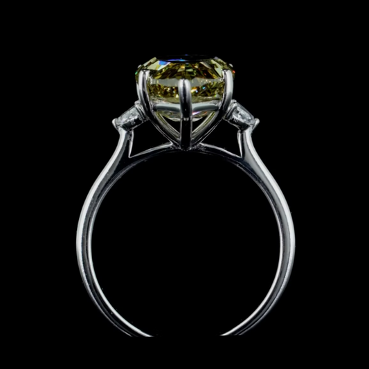 6.32 ct. Yellow Diamond Side Stone Ring