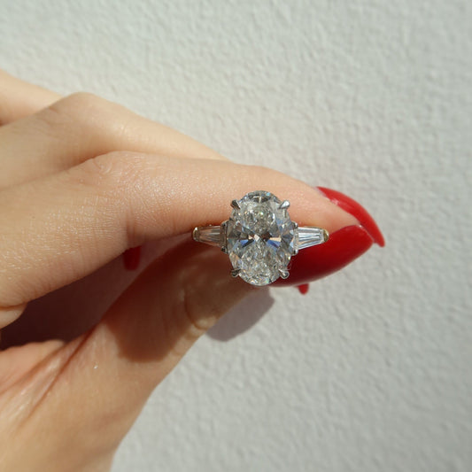 Elysian Oval Diamond Ring with Tapered Baguettes