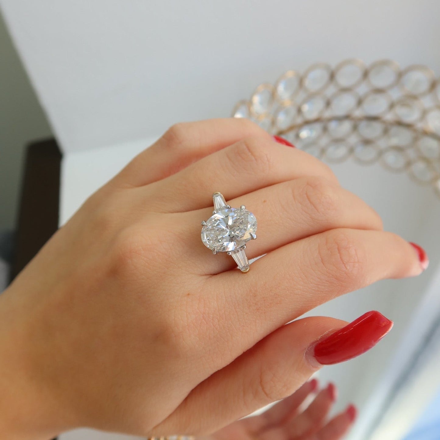 Elysian Oval Diamond Ring with Tapered Baguettes