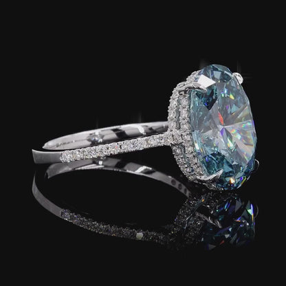 8.18 Ct. Fancy Vivid Blue Oval Diamond Pavé Ring