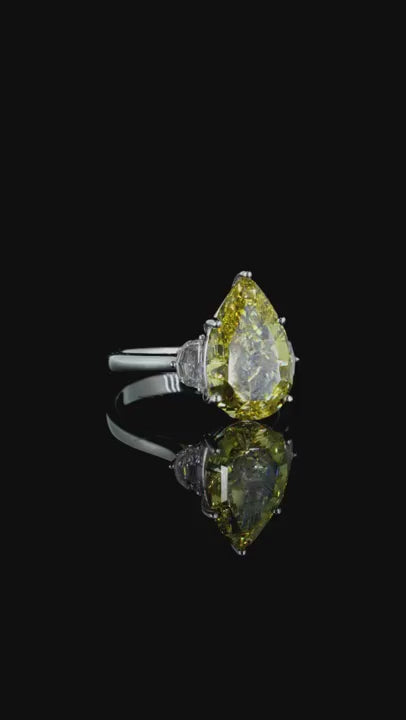 6.02 ct. Yellow Diamond Side Stone Ring