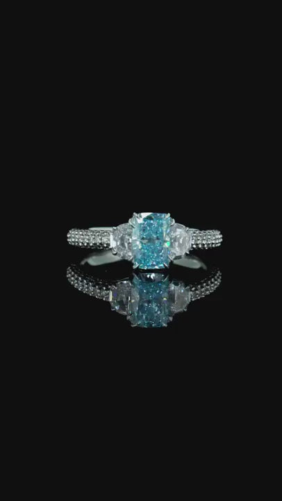 1.08 ct. Blue Diamond Side Stone Ring