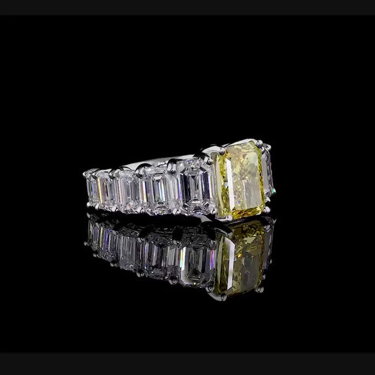 2.72 ct. Yellow Diamond Side Stone Ring
