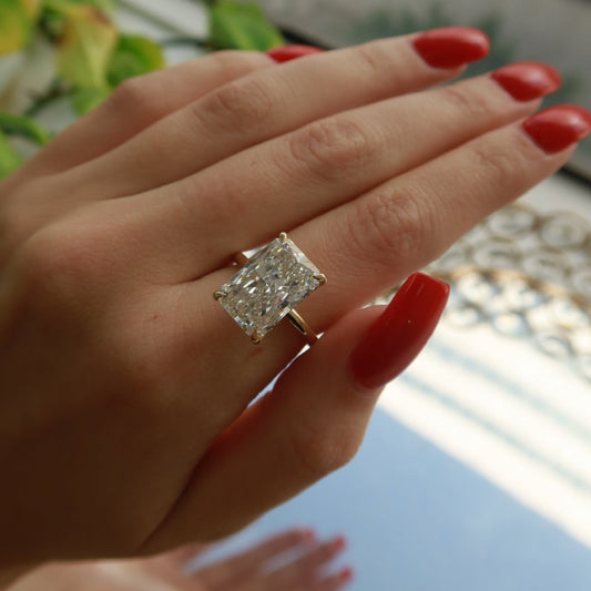 Radiant Elegance 14K Yellow Gold Diamond Solitaire Ring